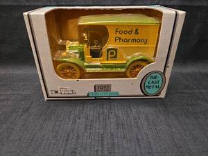 lot 50849 image: ERTL Publix Food & Pharmacy 1912 Open Cab Die-Cast Metal Coin Bank