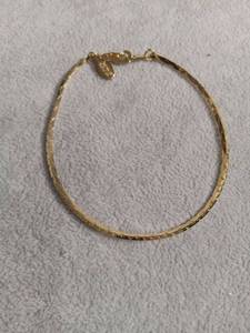 lot 6086 image: Gold-Tone Herringbone Chain Bracelet with Lobster Clasp