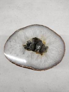lot 62235 image: miniature diorama set inside a natural quartz geode