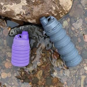 lot 2045 image: YCTMALL Collapsible Water Bottles Two Pack Travel Sports Portable Sport Water Bottle comes with mountaineering Buckle 500ml silicone Water-proof camping water bottle (Purple and Grey Color)