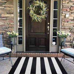 lot 5093 image: CAINANEL Black and White Striped Outdoor Rug 27.5X 43 inches Front Door Mat Hand-Woven Cotton IndoorOutdoor for Layered Mats,Welcome Mat, Porch,Farmhouse,Kitchen,Entry Way