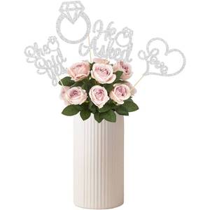 lot 12105 image: Gyufise 12Pcs He Asked She Said Yes Centerpiece Sticks Double Sided Love Heart I Do Ring Table Centerpiece Sticks for Wedding Engagement Bridal Theme Party Supplies Silver