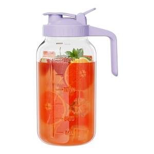 lot 13499 image: Glass Mason Jar Pitcher, 64 oz Wide Mouth Jug with Pour Spout Handle Lid for Cold Brew Coffee, Ice Beverage, Iced Juice, Lemonade, Sun Tea, Fruit Drinks Container(Purple)