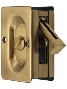 lot 20174 image: Emtek Pocket Door Privacy Lock Set, Antique Brass
