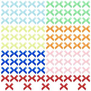 lot 2419 image: 105PCS Mini Bows for Crafts, 7 Colors Small Ribbon Bows for Gift Wrapping Wedding Cake Decoration Card Making Party Decor