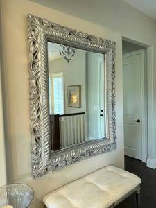 lot 910 image: Silver toned ornate framed beveled mirror 62 x 50 in