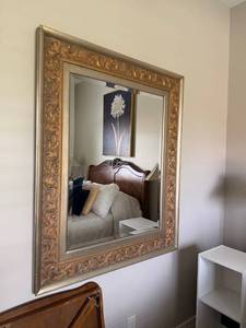 lot 913 image: Ornate framed beveled mirror 54 x 44 in