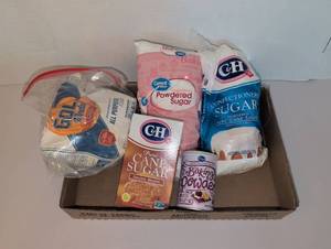 lot 1104 image: Baking ingredients. Sugar, flour and baking powder.