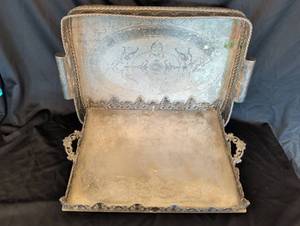 lot 1114 image: Two large metal serving or decor trays