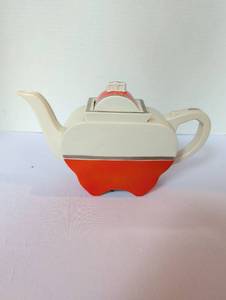 lot 1131 image: Fraunfelter China Art Deco Teapot Orange and Cream 6 in tall