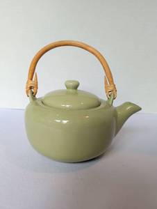 lot 1132 image: Celadon Green Ceramic Teapot with Bamboo Handle and Etched Leaf Design