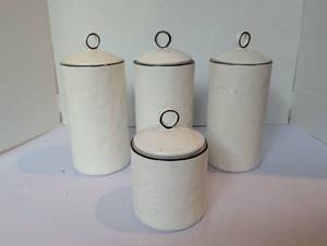 lot 1144 image: White Speckled Ceramic Canister Set with Black Trim&nbsp Set of 4. 3 are 8 inch tall. 1 is 5
