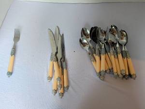 lot 1151 image: Decorative Flatware Set with Ivory-Tone Handles and Ornate Silver-Tone Mounts