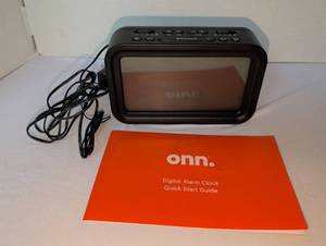 lot 1159 image: Onn Digital Alarm Clock with Color Display