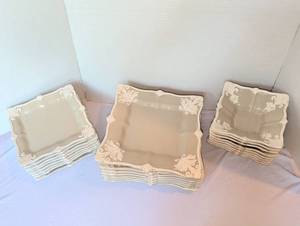 lot 1174 image: A stunning tan and white ornate set of dishes made in Portugal