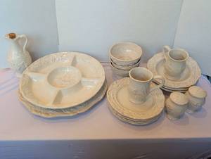 lot 1177 image: Cream Embossed Ceramic Dinnerware Set with Serving Pieces