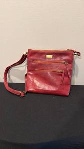 lot 1304 image: Assots red handbag