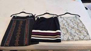 lot 1317 image: White House Black Market and other skirts size 4-6