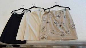 lot 1324 image: White House Black Market and other skirts size 4-6