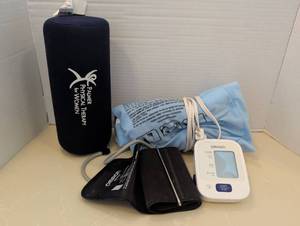 lot 1518 image: Omron Upper Arm Blood Pressure Monitor with Cuff, Heating Pad and pillow