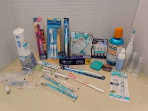 lot 1523 image: Oral Care Bundle - Electric Toothbrush, Toothpaste, Mouthwash & Accessories