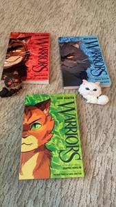 lot 1616 image: Warriors Graphic Novel Set of 3 by Erin Hunter