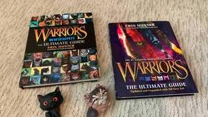 lot 1624 image: Warriors Ultimate Guide Bundle by Erin Hunter with Cat Figures