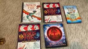 lot 1633 image: Wings of Fire Activity & Guide Book Set by Tui T. Sutherland