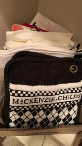 lot 1678 image: Mackenzie Childs pot holders, towel and various dish towels