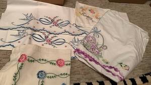 lot 1685 image: Hand embroidered pillow cases and table cloth
