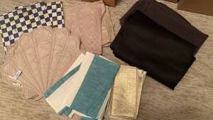 lot 1686 image: Table cloths, place mats and napkins, some McKenzie Childs