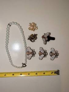 lot 1948 image: costume jewelry lot pearl necklace bee brooches and decorative pins