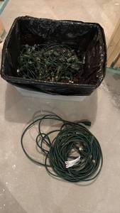 lot 2000 image: Christmas lights and extension cord located in basement