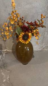 lot 2008 image: Flower pot 21 inches tall with faux floral arrangement located in basement