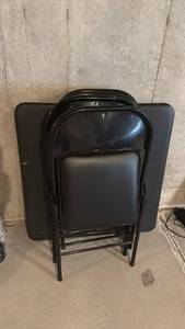 lot 2014 image: Card table with 4 folding chairs all padded located in basement