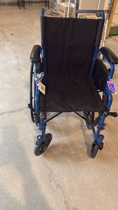 lot 2016 image: Drive transport wheelchair located in basement