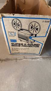 lot 2021 image: Sears Super 8 Sound movie projector located in basement