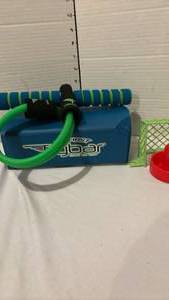 lot 3218 image: Table top hockey game, small screen ft tip dart boards, and a flyboy pogo type jumper