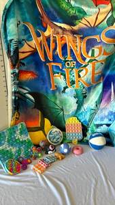 lot 3226 image: Kids Fidget Toy & Sensory Bundle with Wings of Fire Blanket