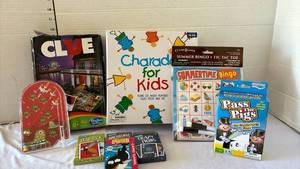 lot 3227 image: Family Game Night Bundle - Clue, Charades for Kids, Pass the Pigs & More