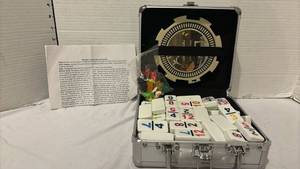 lot 3240 image: Mexican Train Dominoes Set with Aluminum Carry Case