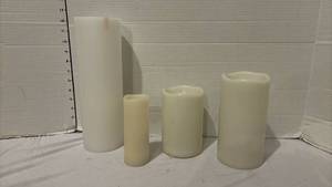 lot 3301 image: Set of 4 Ivory Flameless Candles