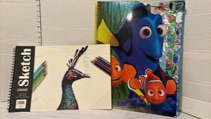 lot 3334 image: Sketchbooks - One has a Lot of stickers