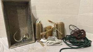 lot 3342 image: Metal Planter with Rope Lights and Extension Cords