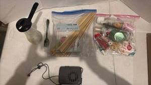 lot 3429 image: Mixed Lot O2Cool Portable Fan, Baking Supplies, Bamboo Skewers, & more