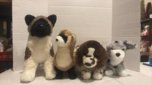 lot 3514 image: Set of 4 Dog Breed Stuffed Animal Plush Toys