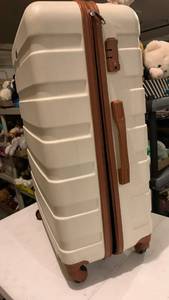 lot 3612 image: Hard sided 360 rolling luggage 29X19