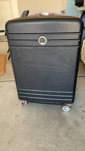 lot 3633 image: Delsey Paris hard sided luggage 26X17