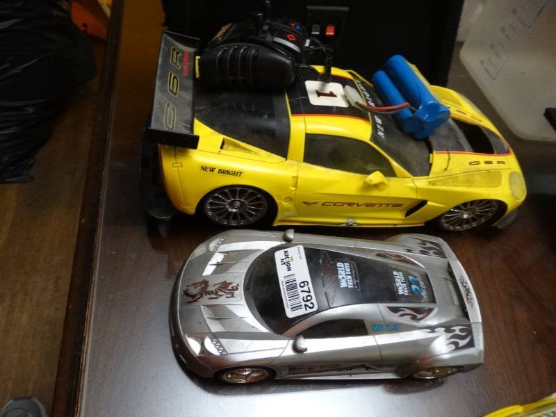 lot 6792 image: New bright remote control car and a car.