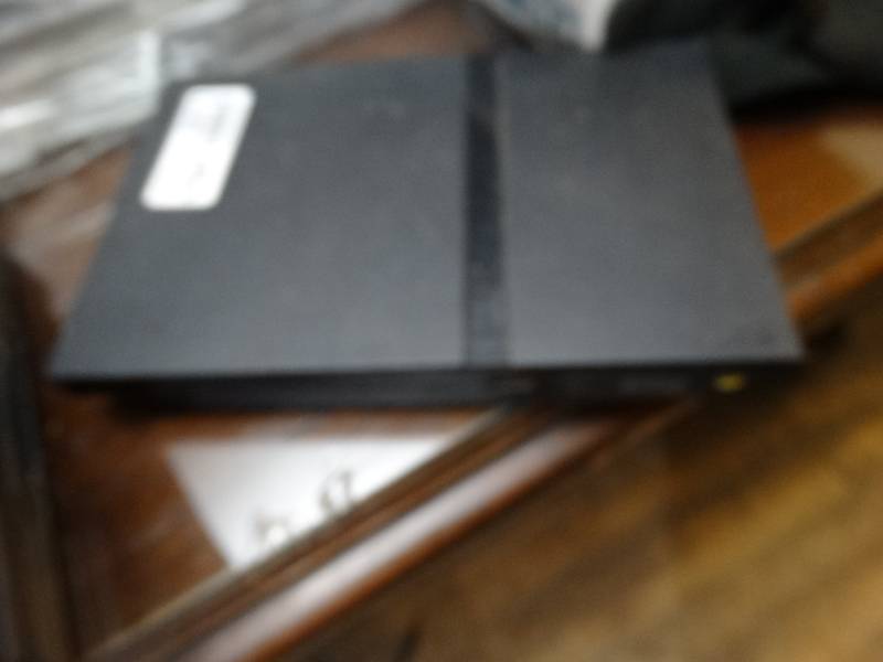 lot 6871 image: Lot of 11 game cube games and 1 playstation 2 game and playstation no cords.